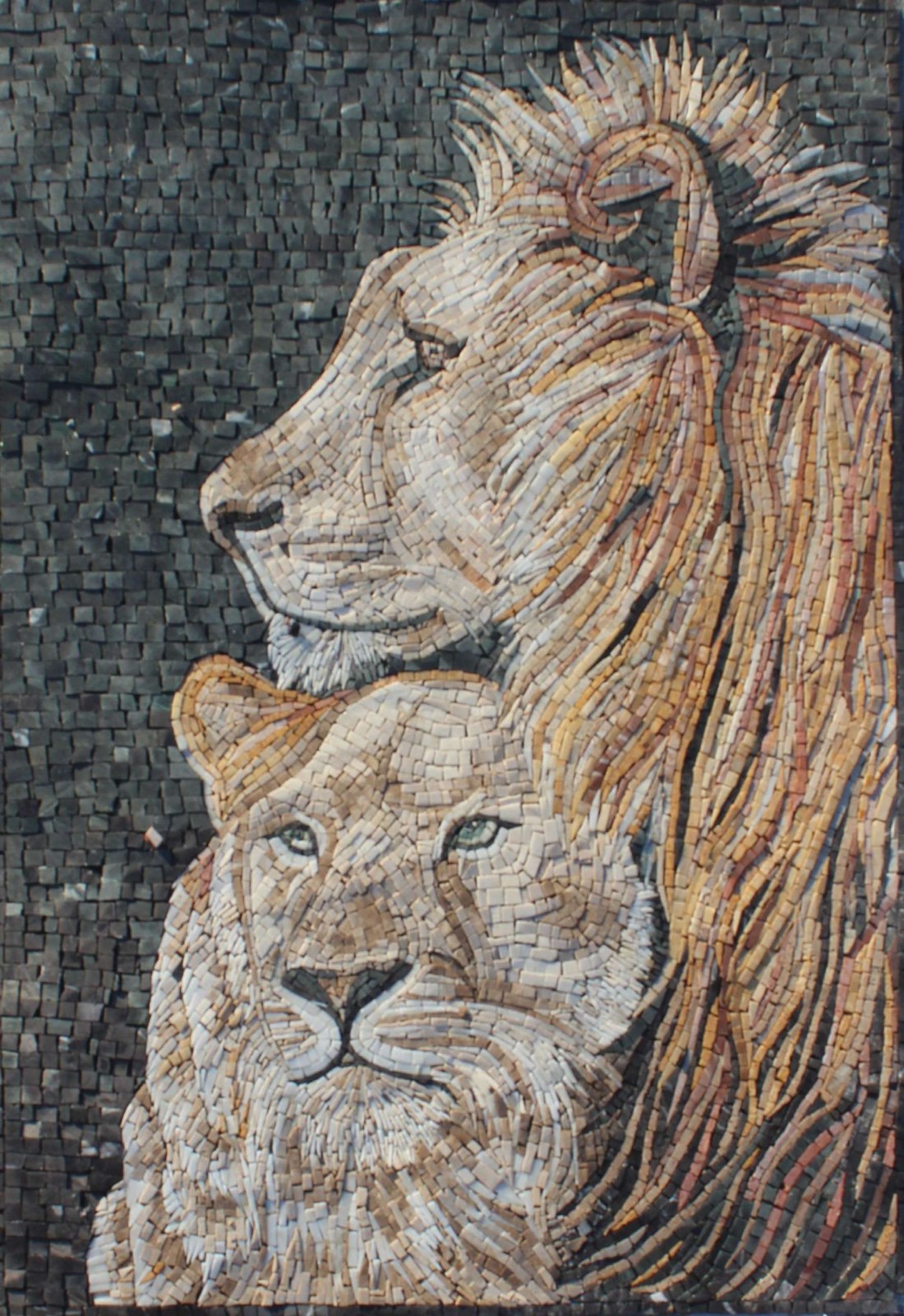 Close-up of two lions depicted in warm natural stone against a dark mosaic background.